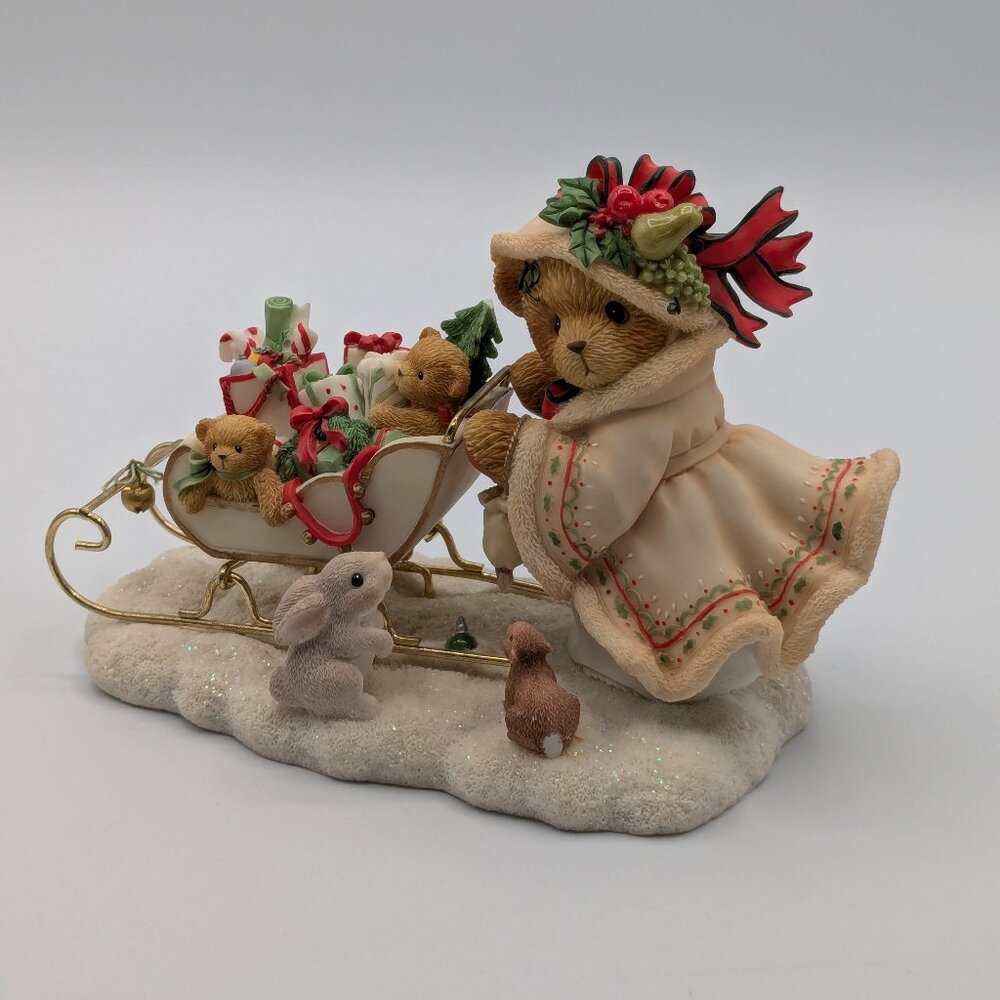 Cherished Teddies Astrid (864218) 2001, Girl Shopping with Sled Figurine